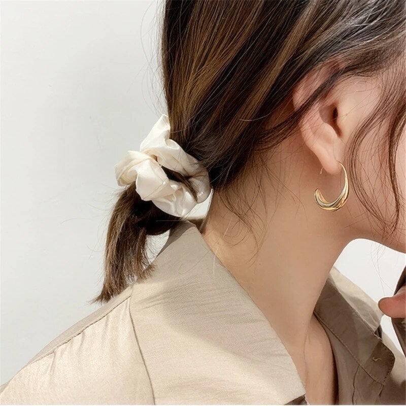 Boucles d'oreilles de luxe en or et en argent