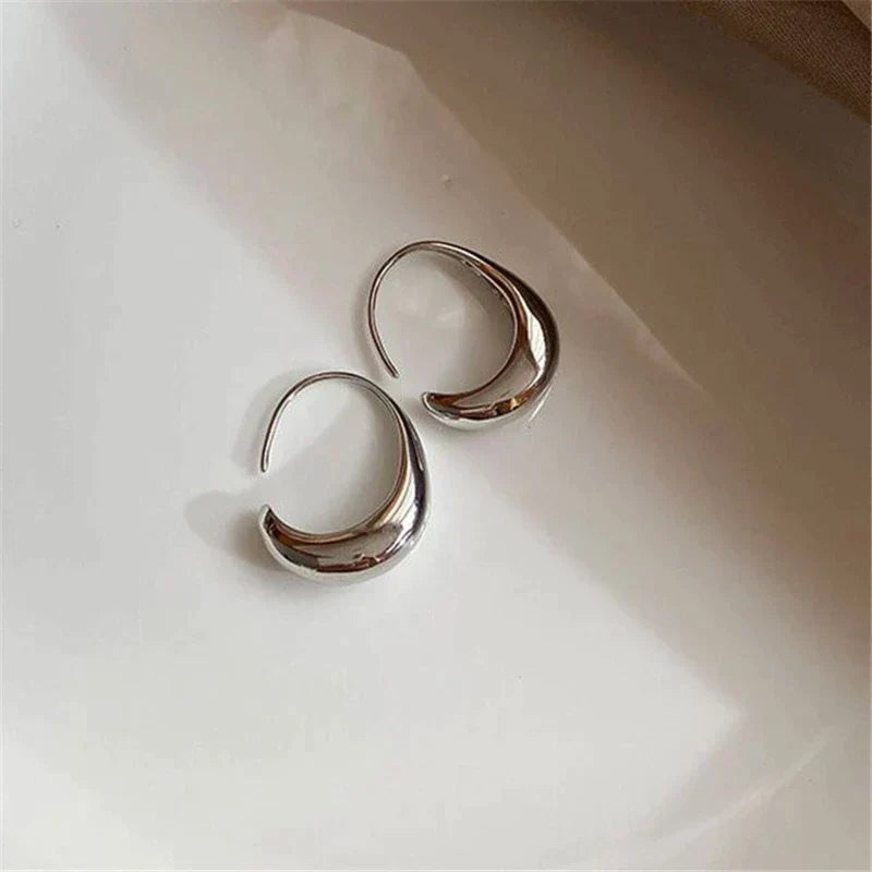 Boucles d'oreilles de luxe en or et en argent